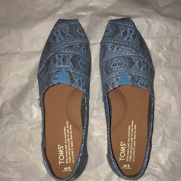 Toms Shoes - TOMS slip ons! Never before worn.